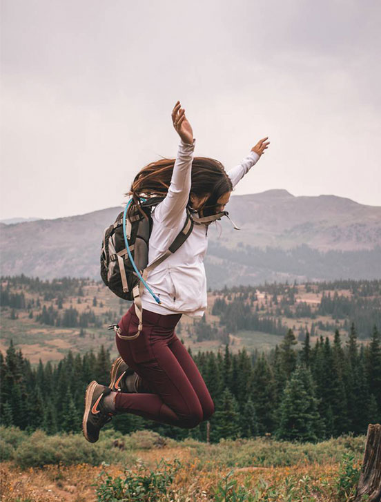 A girl jumping in nature