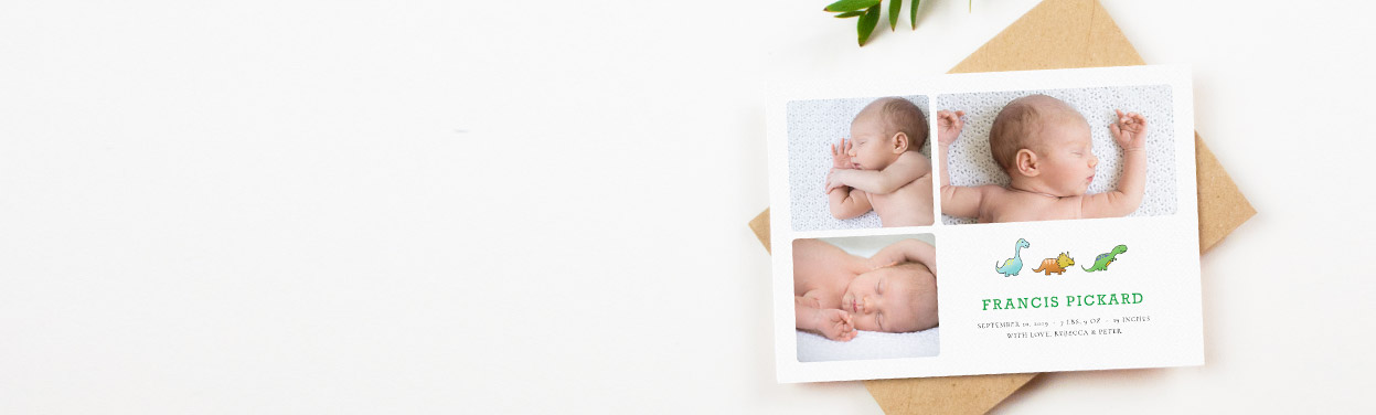 A cute baby announcement card printed with 3 photos of a new-born baby. The card has a cute dinosaur design.