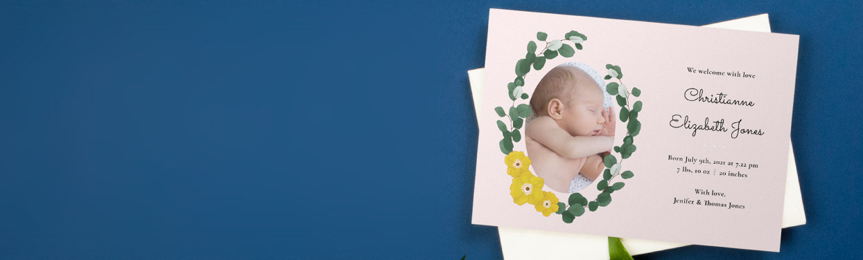 A cute baby boy birth announcement card. The announcement has 3 photos of a baby boy and a fun dinosaur motif in the corner.