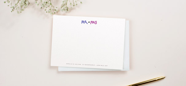 A personalised desk stationery card for couples. The note card is printed with “Mr and Mrs” at the top, with an address at the bottom.