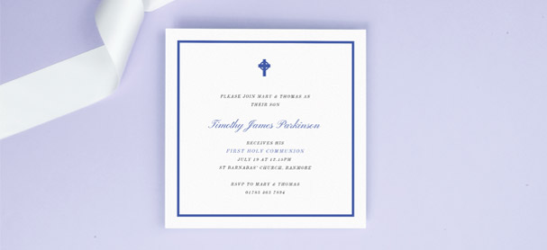 A traditional and religious first holy communion invitation design. The invite has a blue border and ornate crucifix.