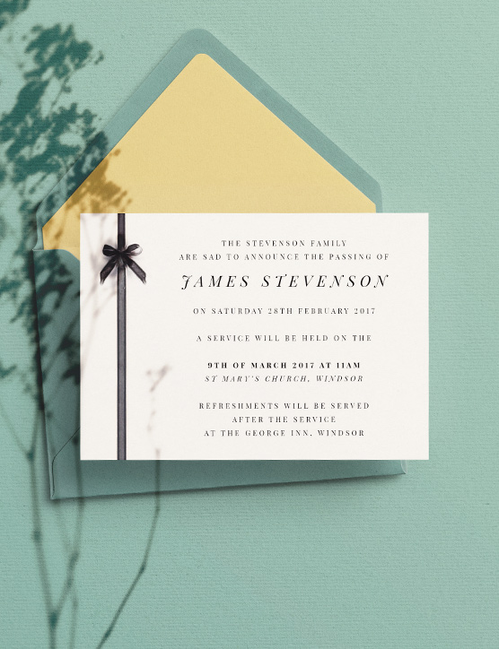 A simple funeral announcement card design. The funeral invitation is printed with a serif font, black ribbon and bow motif down the left of the card.