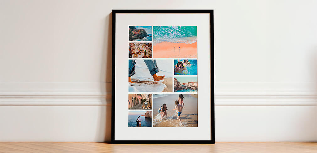 Framed photo collage with white mount and black frame leaning against white wall