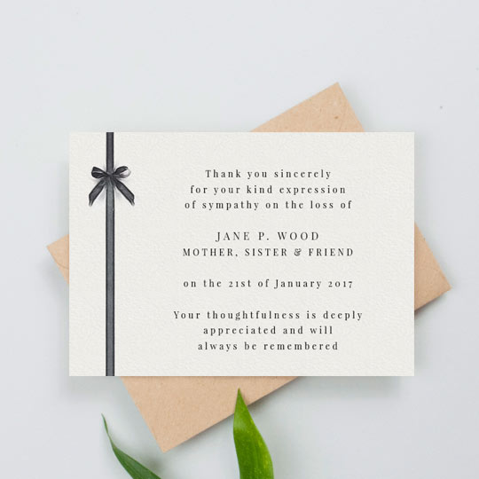 A classic funeral thank you card. The card is landscape with a painted black ribbon running down the left-hand side. The rest of the funeral thank you card has a personalise, printed message of thanks in a smart, black font.