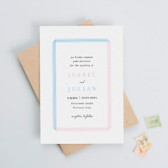 An elegant wedding invitation with a simple blue and pink line border running around the outside of the card. The bridge and grooms name are in pink and blue, and the rest of the wedding information is in black.