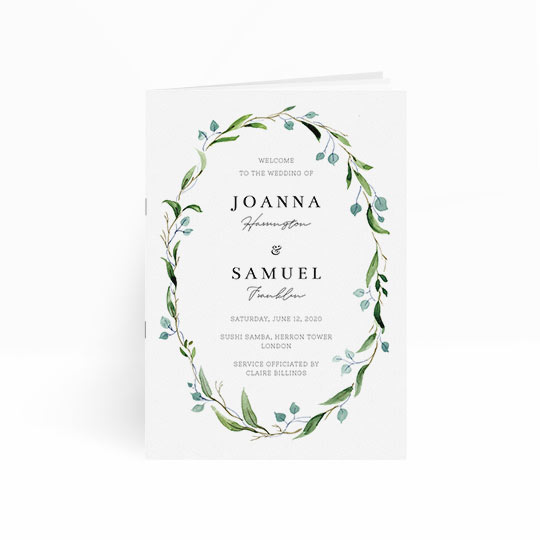 A beautiful wedding order of service design with a green and blue, floral wreath running around the front cover. In the middle of the wreath, the order of service has details of the wedding church service.