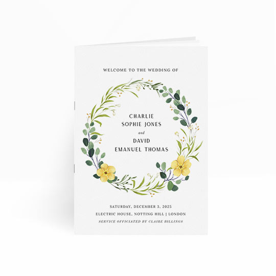 This wedding order of service booklet has multiple pages. The front cover has a floral wreath and surrounds the names of the bride and groom. The details of the wedding service are printed at the bottom of the order of service cover.