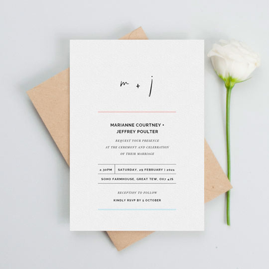 A simple and modern wedding invitation card design with minimalist design features. The top of the wedding invitation has a modern monogram using a quirky font. The rest of the wedding invitation is divided by simple blue and pink lines.