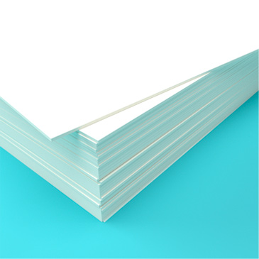 A stack of 350gsm card used for stationer printing