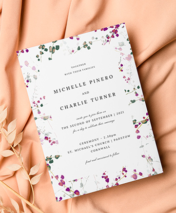 A classic wedding invitation named `purple lupine`. It is printed in portrait format.