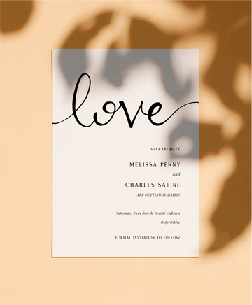 A classic wedding save the date named `simply love`. It is printed in portrait format.