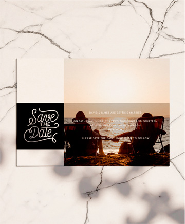 A photo wedding save the date named `2 shades of grey typography`. It is printed in landscape format.