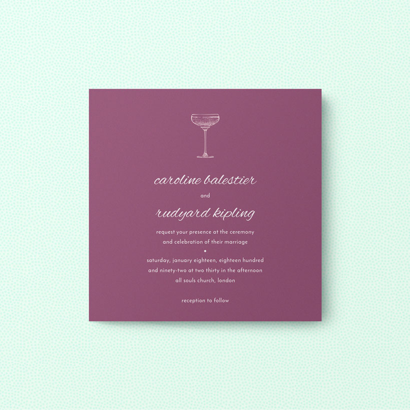 Classic wedding invitation design with a burgundy background and white font