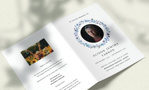 A blue floral funeral order of service design. It has a photo printed on the front cover..