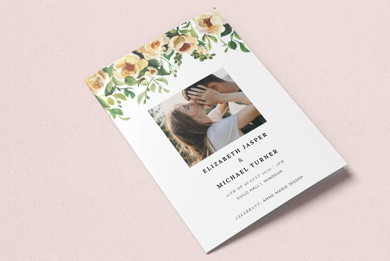 A multiple pages wedding order of service. It is a floral design, with a photo of a couple printed on the front.