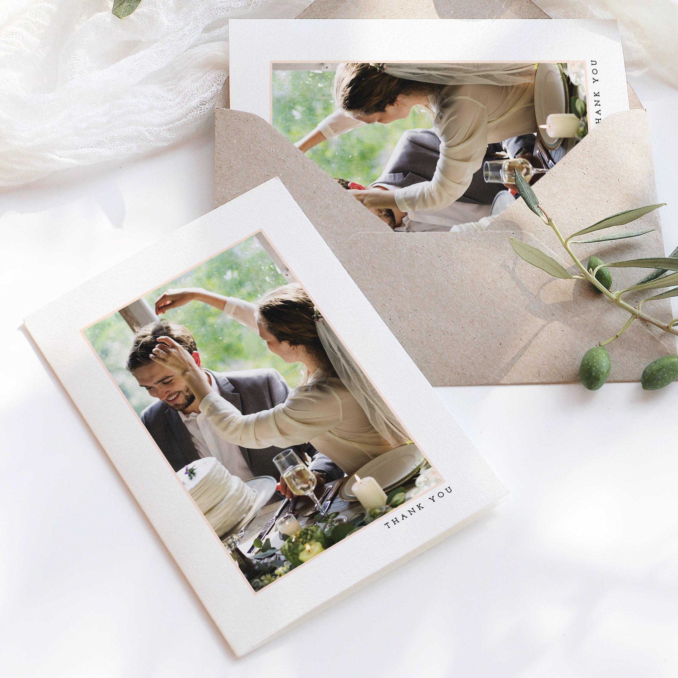 A premium printed wedding thank you card with a single photo and pink border.