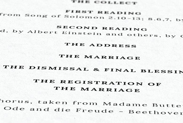A close-up of a serif text printed in a wedding order of service. It is a font called Lora.