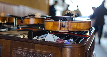 A violin in a church service. A violin in a church service.