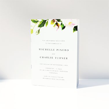 A watercolour design wedding order of service booklet. Pink rose and green leaf motif. A watercolour design wedding order of service booklet. Pink rose and green leaf motif.