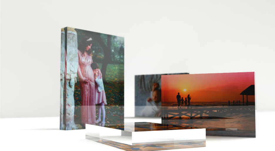 Four acrylic glass photo blocks showcased on a light grey background.