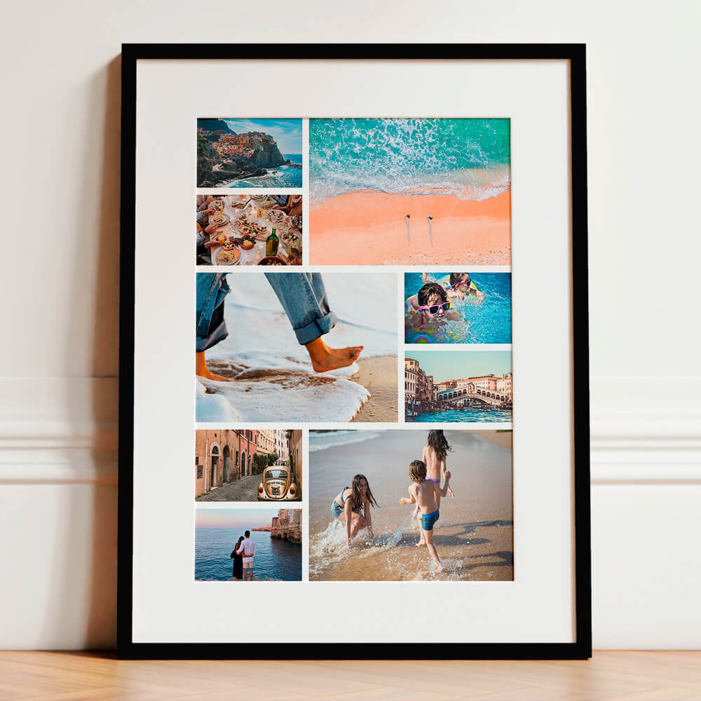 Framed and mounted photo collage with family beach scenes, including children playing, sandy feet, and coastal views, presented in a black frame with white mount
