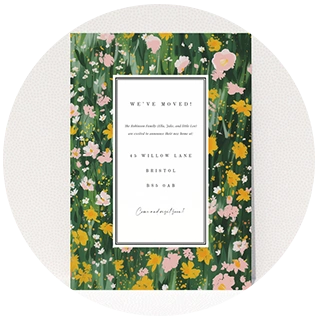 Green floral meadow change of address card with modern typography