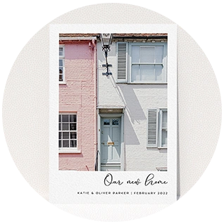 Photo change of address card with pastel houses and our new home text