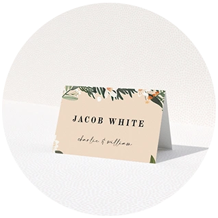 Rustic place card with tropical floral design and guest name