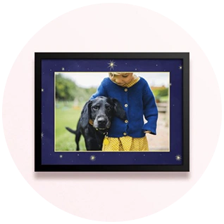 Simple framed nursery photo print with deep blue starry background